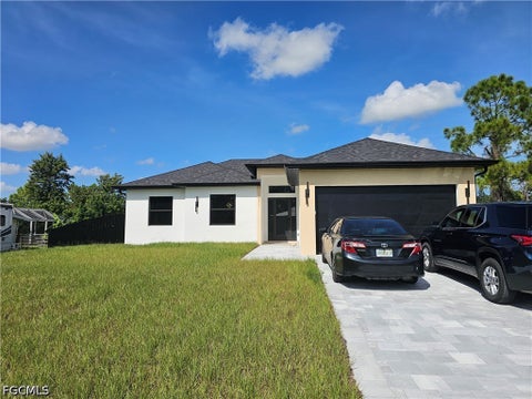 Photo of 1211 McKinley Avenue, Lehigh Acres, FL 33972 (MLS # 2026039387)