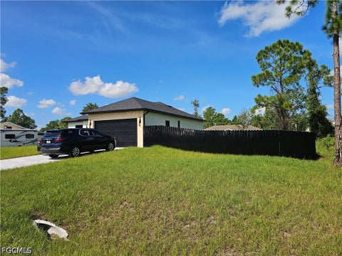 Tiny photo for 1211 McKinley Avenue, Lehigh Acres, FL 33972 (MLS # 2026039387)