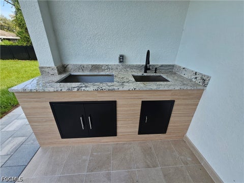 Tiny photo for 1211 McKinley Avenue, Lehigh Acres, FL 33972 (MLS # 2026039387)