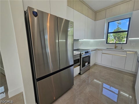 Tiny photo for 1211 McKinley Avenue, Lehigh Acres, FL 33972 (MLS # 2026039387)