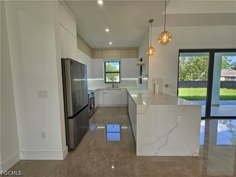 Tiny photo for 1211 McKinley Avenue, Lehigh Acres, FL 33972 (MLS # 2026039387)