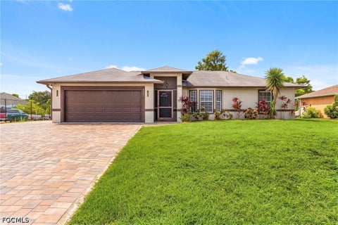 Photo of 4407 6th Street W, Lehigh Acres, FL 33971 (MLS # 2026040309)