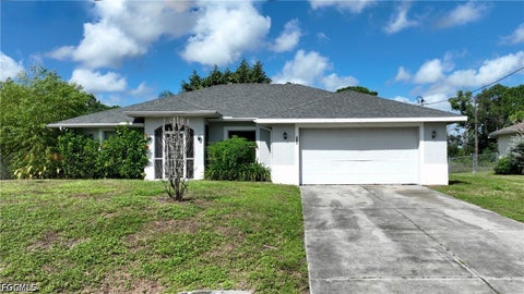 Photo of 528 Empire Avenue S, Lehigh Acres, FL 33974 (MLS # 2026039801)