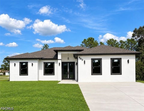 Photo of 843 Andover Avenue S, Lehigh Acres, FL 33974 (MLS # 2026037500)