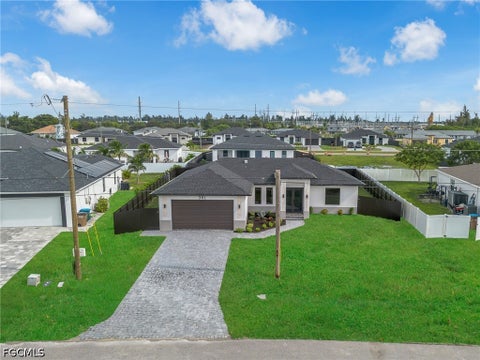 Photo of 351 SW 24th Place, Cape Coral, FL 33991 (MLS # 2026042679)