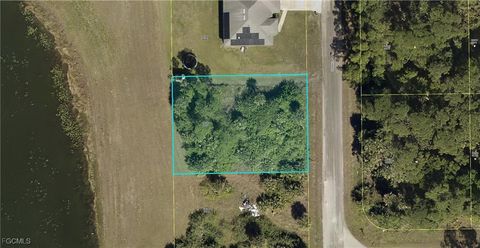 Tiny photo for 850 Haskell Street E, Lehigh Acres, FL 33974 (MLS # 2025013636)