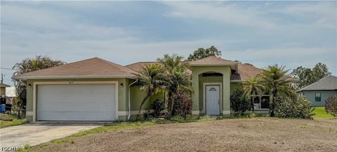 Photo of 3417 28th Street SW, Lehigh Acres, FL 33976 (MLS # 2026014463)