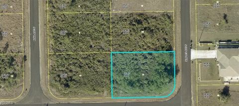 Photo of 724 Naples Ave S Ave, Lehigh Acres, FL 33974 (MLS # 2025016840) Photo of 724 Naples Ave S Ave, Lehigh Acres, FL 33974 (MLS # 2025016840)