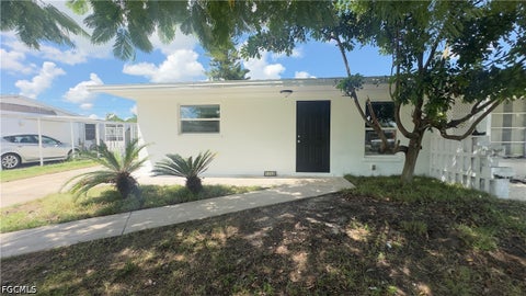 Photo of 1119 Vineyard Place, Lehigh Acres, FL 33936 (MLS # 2026038767)