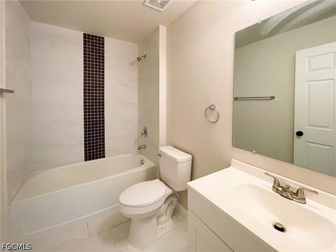 Tiny photo for 507 NE 7th Avenue, Cape Coral, FL 33909 (MLS # 2026020366)