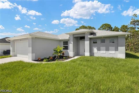 Photo of 3112 16th Street W, Lehigh Acres, FL 33971 (MLS # 2026016649)