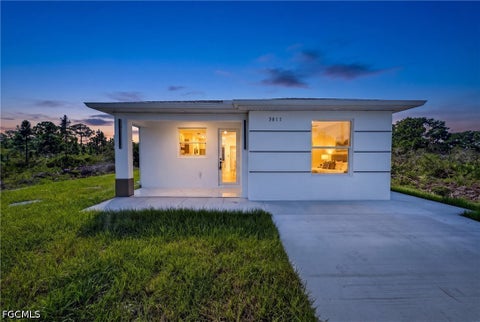 Photo of 3011 40th Street W, Lehigh Acres, FL 33971 (MLS # 2026041082)