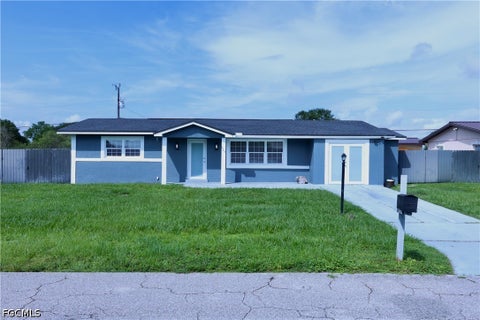 Photo of 321 Rushmore Avenue N, Lehigh Acres, FL 33936 (MLS # 2026039821)