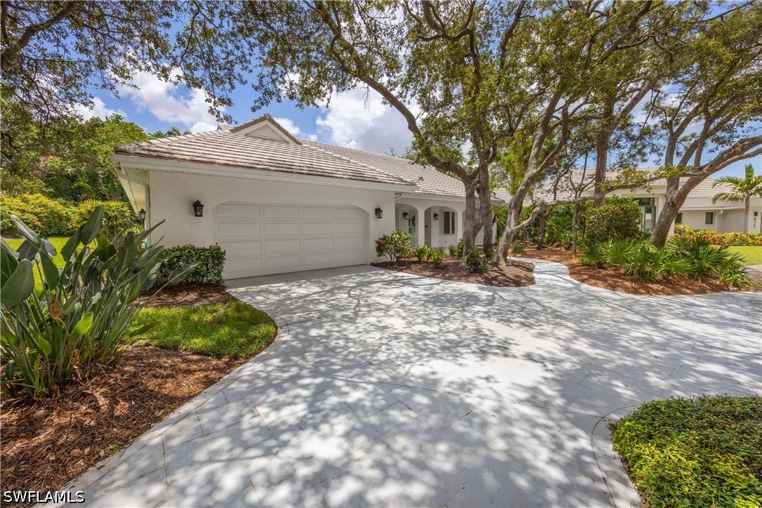 Photo 1 of 33 — 816 Turkey Oak Lane, Naples, FL 34108