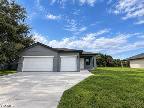 Photo of 335 McArthur Boulevard, Lehigh Acres, FL 33974 (MLS # 2026042154)