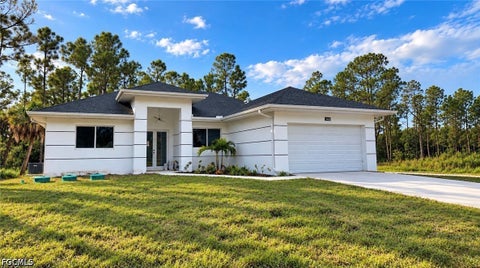 Photo of 3400 E 14th Street, Lehigh Acres, FL 33972 (MLS # 2026041866)