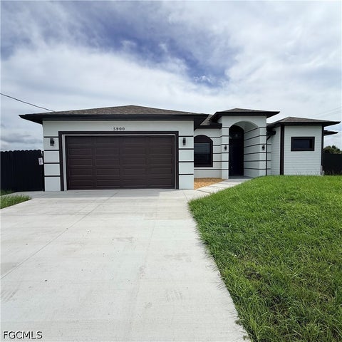 Photo of 5900 Queen Avenue N, Lehigh Acres, FL 33971 (MLS # 2026042403)