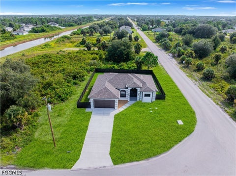 Photo of 5900 Queen Avenue N, Lehigh Acres, FL 33971 (MLS # 2026042403)