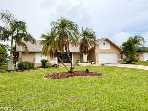Photo of 810 El Dorado Parkway W, Cape Coral, FL 33914 (MLS # 2026030831)