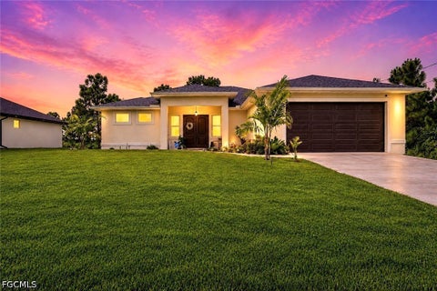 Photo of 2609 27th Street W, Lehigh Acres, FL 33971 (MLS # 2026039794)