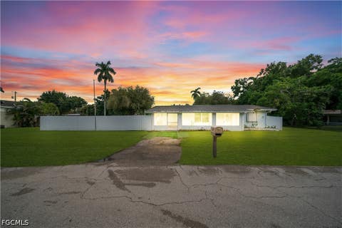 Photo of 77 Glenmont Drive W, North Fort Myers, FL 33917 (MLS # 2026034832)
