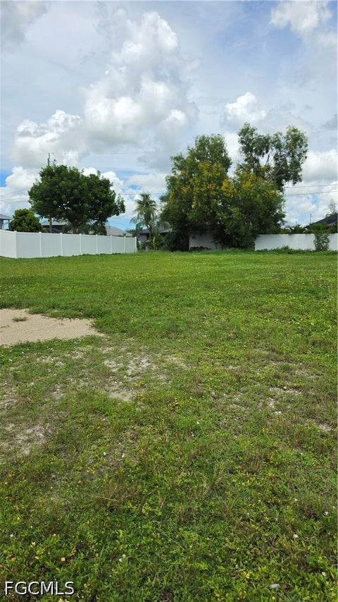 Photo of 611 SW 27th Terrace, Cape Coral, FL 33914 (MLS # 2026039573)