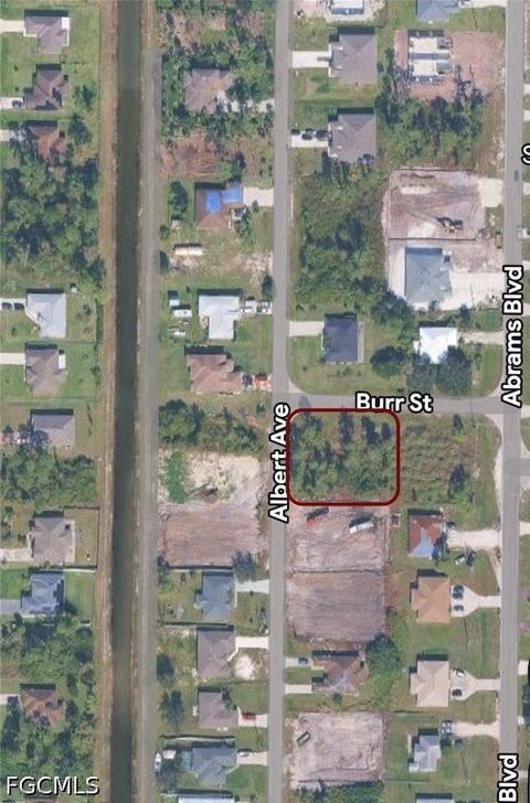 Photo of 1054/1056 Albert Ave Ave, Lehigh Acres, FL 33971 (MLS # 2026018948)