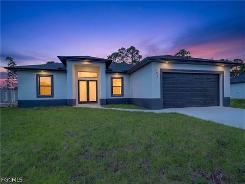 Photo of 792 Bell Boulevard S, Lehigh Acres, FL 33974 (MLS # 2026041556)