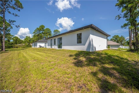Tiny photo for 3121 69th Street W, Lehigh Acres, FL 33971 (MLS # 2026036030)