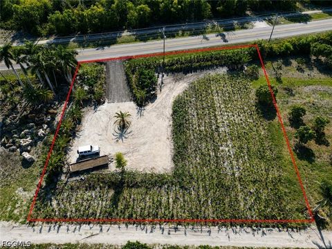 Photo of 11851 Stringfellow Road, Bokeelia, FL 33922 (MLS # 2026020112)