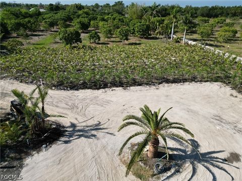 Tiny photo for 11851 Stringfellow Road, Bokeelia, FL 33922 (MLS # 2026020112)