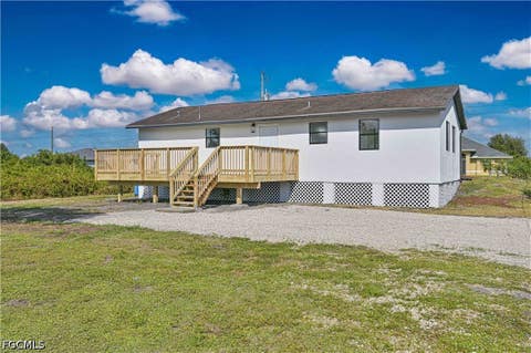 Photo of 3301 38th Street SW, Lehigh Acres, FL 33976 (MLS # 2026030936)