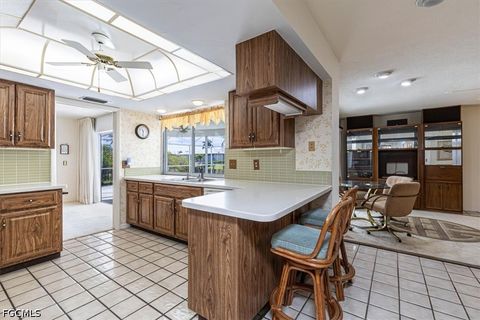 Photo of 9841 Cypress Lake Drive, Fort Myers, FL 33919 (MLS # 2026018035)