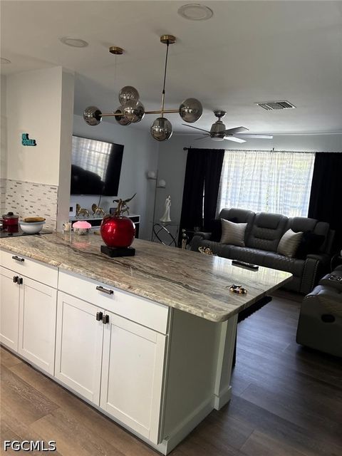Tiny photo for 2702 SE 17th Place, Cape Coral, FL 33904 (MLS # 2026019915)