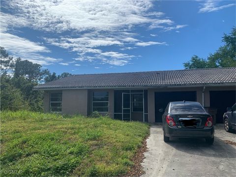 Photo of 650 Creuset Avenue S, Lehigh Acres, FL 33974 (MLS # 2025018184)