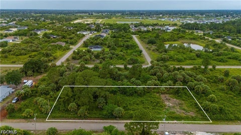 Photo of 314 Laurel Avenue S, Lehigh Acres, FL 33974 (MLS # 2026031070)