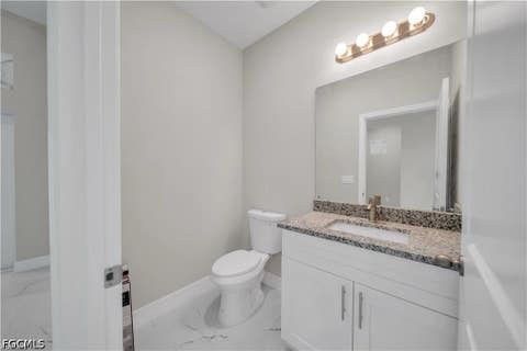 Tiny photo for 543 McArthur Boulevard, Lehigh Acres, FL 33974 (MLS # 2026033747)