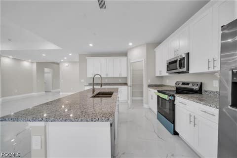Tiny photo for 543 McArthur Boulevard, Lehigh Acres, FL 33974 (MLS # 2026033747)