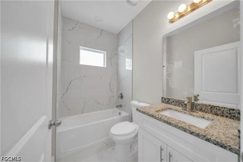 Tiny photo for 543 McArthur Boulevard, Lehigh Acres, FL 33974 (MLS # 2026033747)