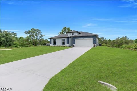 Tiny photo for 543 McArthur Boulevard, Lehigh Acres, FL 33974 (MLS # 2026033747)