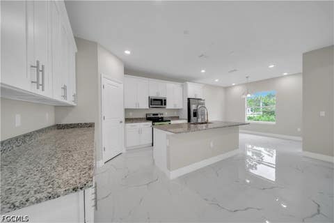 Tiny photo for 543 McArthur Boulevard, Lehigh Acres, FL 33974 (MLS # 2026033747)