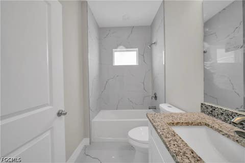 Tiny photo for 543 McArthur Boulevard, Lehigh Acres, FL 33974 (MLS # 2026033747)
