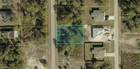 Photo of 225 Ogden Avenue S, Lehigh Acres, FL 33974 (MLS # 2026020237)