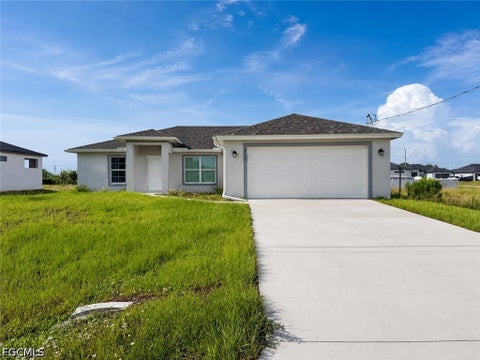 Photo of 2711 20th Street SW, Lehigh Acres, FL 33976 (MLS # 2026035078)