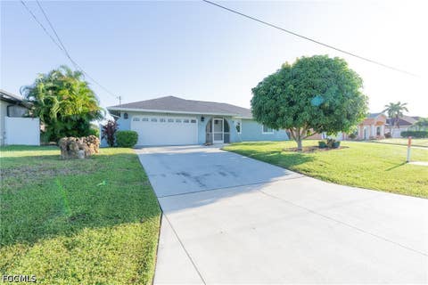 Photo of 115 SE 35th Terrace, Cape Coral, FL 33904 (MLS # 2026034882)