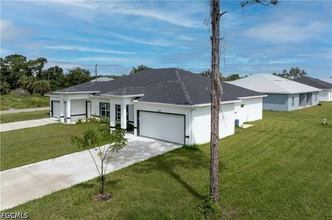 Photo of 702 Broadway Avenue, Lehigh Acres, FL 33972 (MLS # 2026020315)