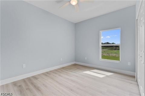 Tiny photo for 702 Broadway Avenue, Lehigh Acres, FL 33972 (MLS # 2026020315)
