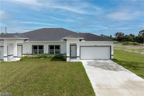 Tiny photo for 702 Broadway Avenue, Lehigh Acres, FL 33972 (MLS # 2026020315)