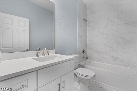 Tiny photo for 702 Broadway Avenue, Lehigh Acres, FL 33972 (MLS # 2026020315)