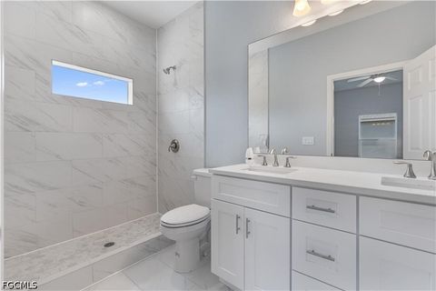 Tiny photo for 702 Broadway Avenue, Lehigh Acres, FL 33972 (MLS # 2026020315)